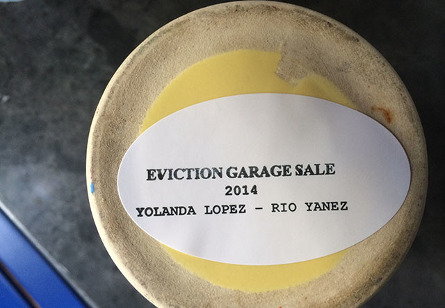 The sticker on each item for garage  sale held in May, 2014. Photo by Lydia Chávez. 
