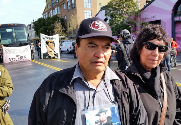 Refugio (left) and Elvira Nieto, parents of victim of police shooting, at the Mission Station protest. Photo by Daniel Hirsch.