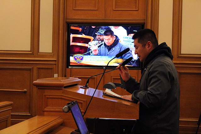 An SFPD police officer addresses the Police Commission