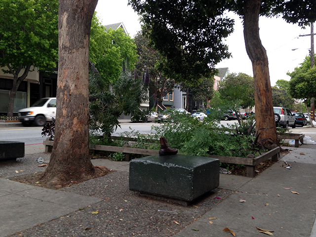 The small gathering area at Bryant and 21st in front of Fortune Drycleaners.